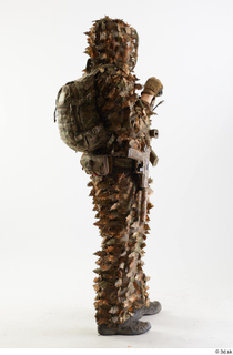 Frankie Perry Pose in Ghillie with Gun holding gun standing…